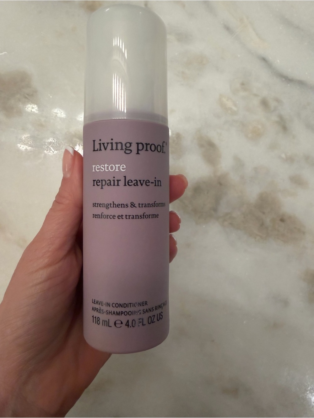 Living Proof Restore Repair Leave-In Conditioner — Lavender-Pink Bottle